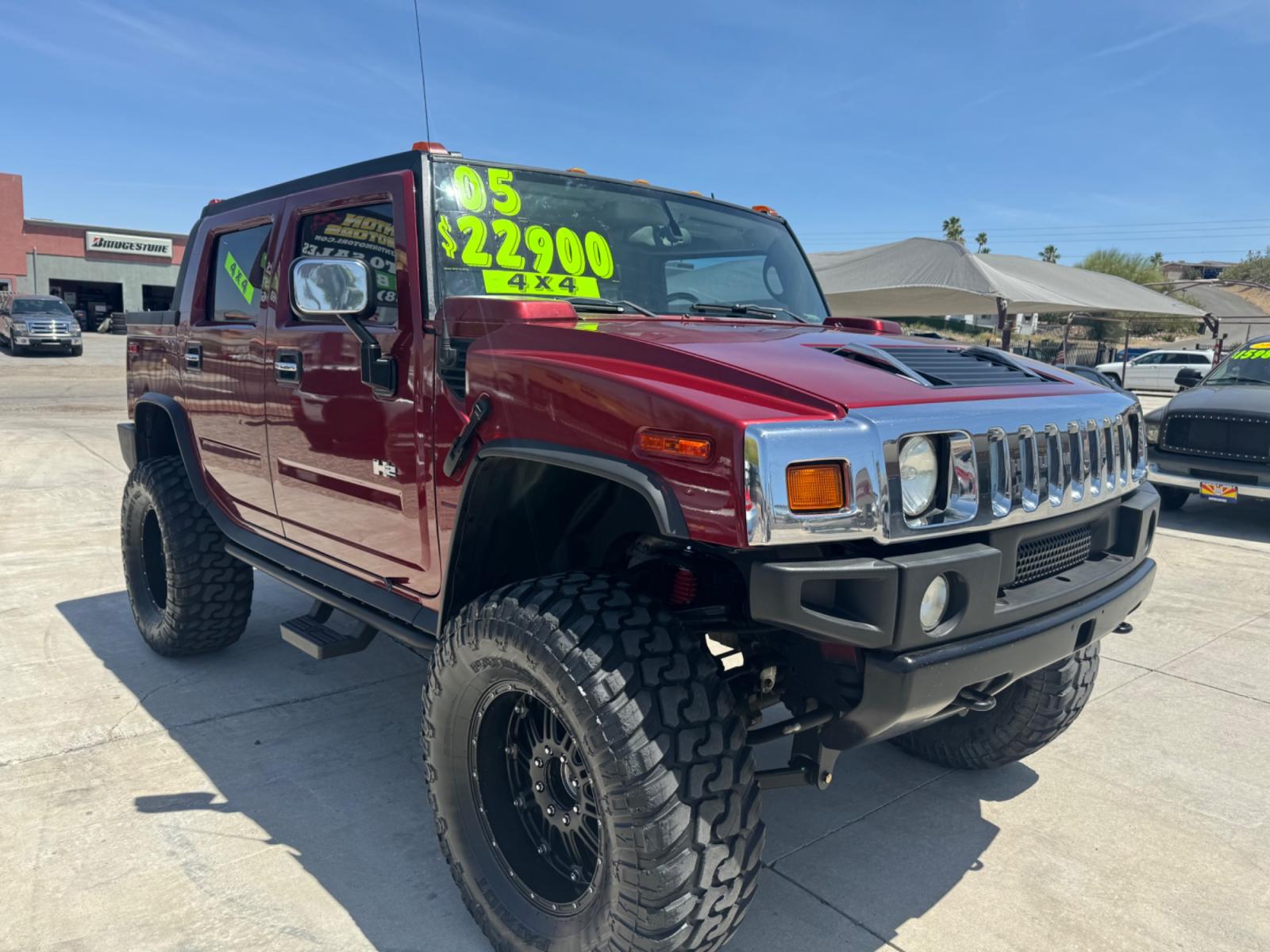 2005 Red /black Hummer H2 SUT , located at 2190 Hwy 95, Bullhead City, AZ, 86442, (928) 704-0060, 0.000000, 0.000000 - 2005 Hummer H2 SUT. only 92k miles. 6.0 V8 4 wheel drive. New transmission with warranty. New shocks. lots of extras .onstar. backup camera, custom stereo. fabtech 6 in lift with 40 in tires. Big Bad Hummer. $22900. Free and clear title. - Photo #0